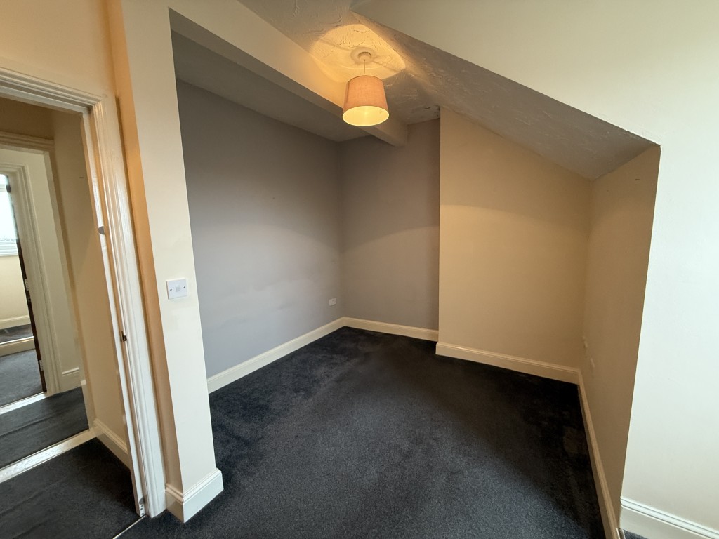 Lot: 119 - VACANT ONE-BEDROOM FLAT - Bedroom with neutral colours and grey carpet